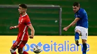 Penyerang Timnas Italia, Andrea Belotti, saat berhadapan dengan Polandia pada laga kelima Grup 1 Liga A UEFA Nations League 2020/2021, di Mapei Stadium, Senin (16/11/2020) dini hari WIB. (AFP/MIGUEL MEDINA)