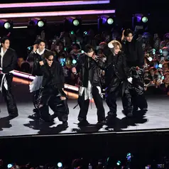 BTS tampil selama konser mereka di Gwanghwamun Square, Seoul, Korea Selatan, pada 21 Maret 2026. (KIM Min-Hee/POOL/AFP)