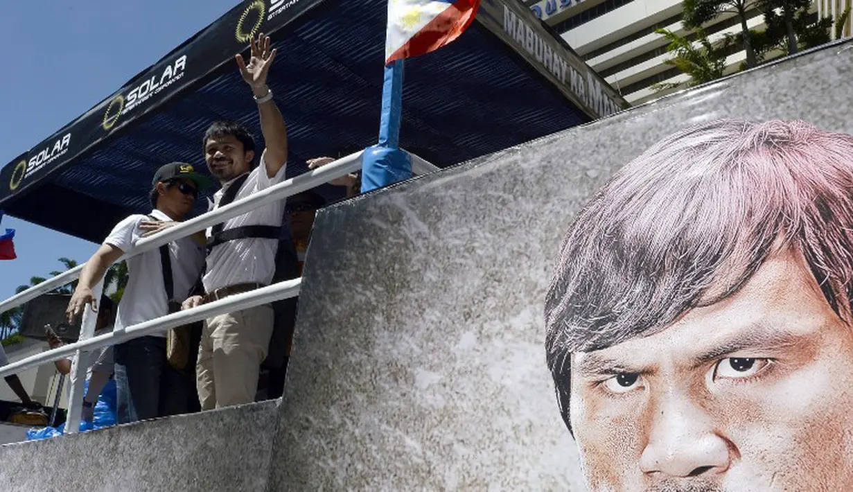 Parade penyambutan Manny Pacquiao. (AFP PHOTO/NOEL CELIS)
