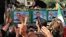 Kepala Dewan Koordinasi Pembangunan Islam Teheran, Mohsen Mahmoudi mengatakan bahwa ini akan menjadi hari yang bersejarah bagi Iran Islam dan revolusi. (ATTA KENARE/AFP)