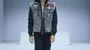 Masih dalam koleksi Bespoke Jeans Lab, kombinasi zipper jacket dengan vest menambah daya tarik tersendiri. (JFW).