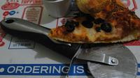 Ilustrasi Domino Pizza (Foto: Jose Castillo/Unsplash)
