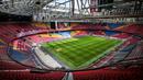 Sebelum bernama Johan Cruyff ArenA, stadion ini memiliki nama Amsterdam ArenA sebagai markas dari klub Ajax Amsterdam. Penggantian nama stadion untuk mengenang legenda Ajax Amsterdam Johan Cruyff yang wafat pada 24 Maret 2016. (AFP/Remko de Wall/ANP)