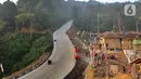 Akses jalan yang mulus menuju kawasan Gunung Luhur di Desa Citorek Kidul, Kecamatan Cibeber, Kabupaten Lebak, Banten, Sabtu (23/11/2019). Akses menuju Negeri di Atas Awan Lebak Banten yang sempat viral di medsos ini bisa ditempuh naik kendaraan roda dua maupun empat. (merdeka.com/Arie Basuki)