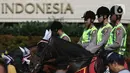 Polisi berkuda saat berpatroli di car free day  di Bundaran Hotel Indonesia, Jakarta Pusat, Minggu (12/1/2020). Kehadiran polisi berkuda ini sebagai bentuk dukungan terhadap program CFD pemerintah. (Liputan6.com/Angga Yuniar)