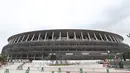 Pandangan umum Stadion Nasional Tokyo, yang akan menjadi pusat penyelenggaraan Olimpiade 2020, saat dipertunjukkan kepada media di Tokyo, Rabu (3/7/2019). Stadion berkapasitas 60 ribu itu akan menjadi venue upacara pembukaan serta berbagai nomor atletik dan cabang sepak bola. (Behrouz MEHRI/AFP)