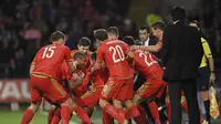 SELEBRASI - Para pemain Wales melakukan selebrasi usai Aaron Ramsey mencetak gol ke gawang Andorra. (Reuters / Rebecca Naden)