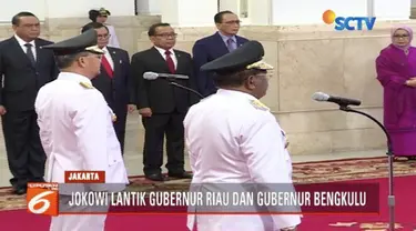 Presiden Jokowi lantik Wan Thamrin sebagai Plt gubernur Riau dan Rohidin Mersyah sebagai gubernur Bengkulu di Istana Negara, Jakarta.