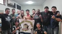 Muhammad Aqsal Akbari usai berhasil mengalahkan Lindo Gustian Saputra dari Yon Taifib 1 Marinir di Kejuaraan Tarungga Dankomar Fighting Championship 2023 (Liputan6.com/Istimewa).