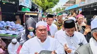 Jamaah asal Jakarta Rela Panas-panasan demi ikuti Haul Habib Ali di Solo (Dewi Divianta/Liputan6.com)