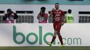 Striker Persija Jakarta, Marko Simic, merayakan gol yang dicetaknya ke gawang Persela Lamongan pada laga Shopee Liga 1 di Stadion Wibawa Mukti, Bekasi, Jumat (15/11). Persija menang 4-3 atas Persela. (Bola.com/Yoppy Renato)