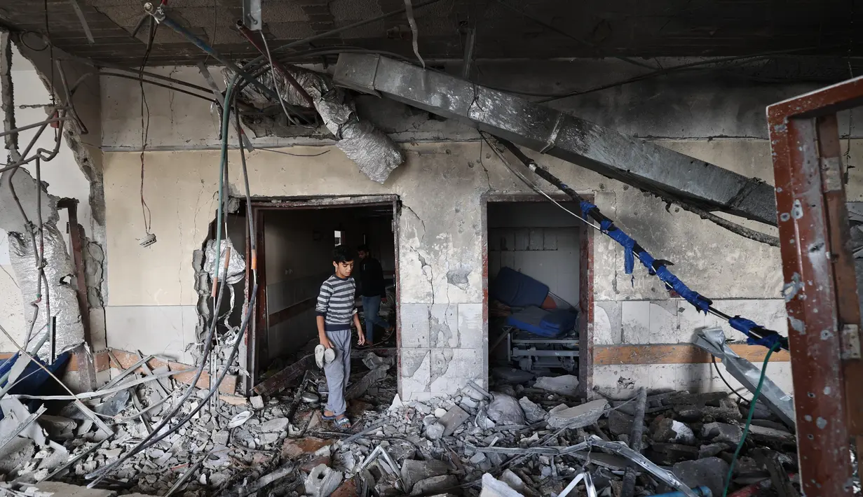 Militer Israel juga mengatakan bahwa serangan itu menargetkan Aslih dan menuduhnya beroperasi untuk Hamas dengan kedok sebagai wartawan. (Eyad BABA/AFP)