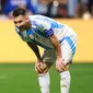 Ekspresi kecewa pemain Argentina, Lionel Messi setelah gagal mencetak gol ke gawang Kanada pada laga Grup A Copa America 2024 di Mercedes-Benz Stadium, Atlanta, Georgia, Jumat (21/06/2024). (AFP/Hector Vivas)