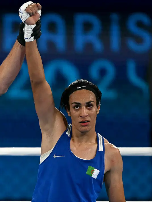Di final, Imane Khelif akan duel melawan petinju China Liu Yang. Liu Yang lolos ke final usai mengalahkan wakil Taiwan Nien Chin Chen di semifinal, Rabu (7/8) dini hari WIB. (Mauro PIMENTEL / AFP)