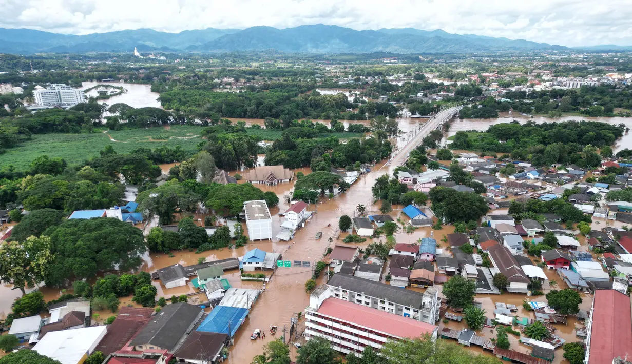 Banjir menerjang wilayah Chiang Mai dan Chiang Rai, Thailand menyusul dampak Topan Yagi. (Lillian SUWANRUMPHA/AFP)