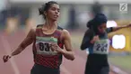 Atlet asal Maluku, Alvin Tehupeiory saat menyelesaikan lomba lari 100 meter putri senior Kejurnas Atletik U18, U20 dan Senior 2019 di Stadion Pakansari, Kab Bogor, Jumat (2/8/2019). Alvin Tehupeiory meraih posisi pertama dengan catatan waktu 11,64 detik. (Liputan6.com/Helmi Fithriansyah)