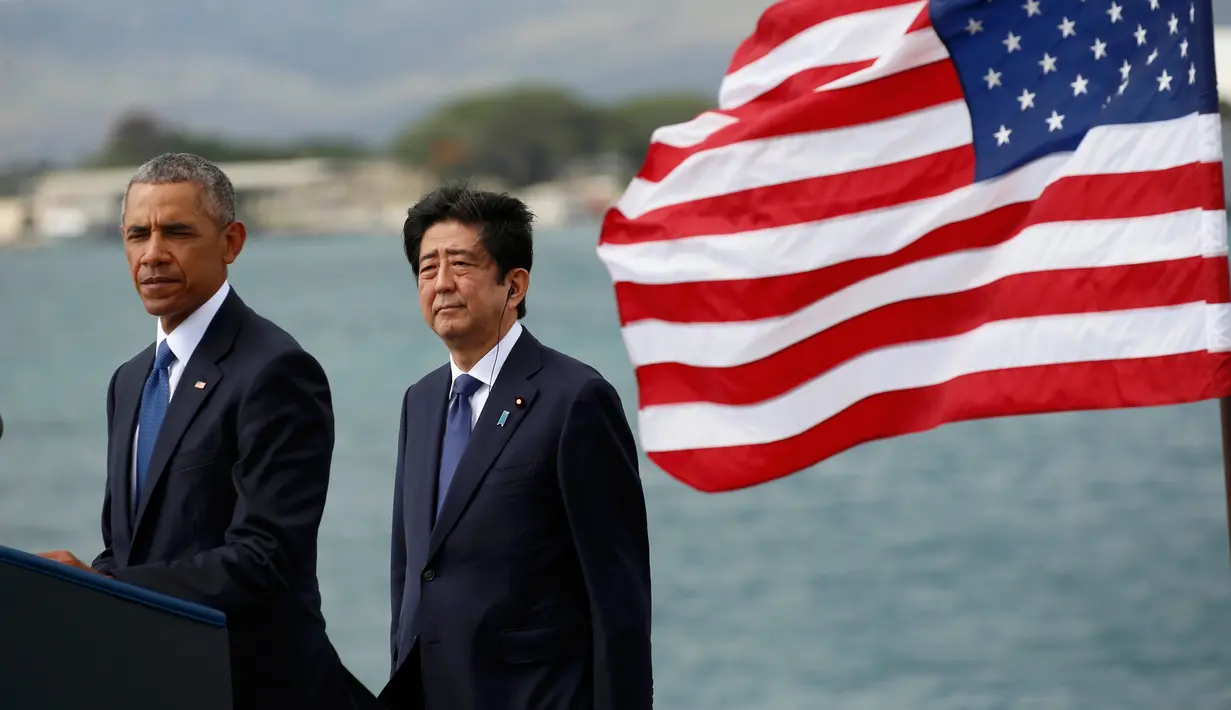 Presiden AS Barack Obama berbicara di Joint Base Pearl Harbor-Hickam, Hawaii, (27/12). (REUTERS/Kevin Lamarque)