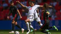 Aksi Jude Bellingham bersama timnas Inggris saat melawan Ukraina di Euro 2020 / 2021 (AFP)
