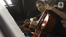Sejumlah remaja berlatih orchestra untuk persiapan penampilan konser A Night of Light di Gripastudio, Jakarta, Sabtu (4/11/2023). (Liputan6.com/Herman Zakharia)