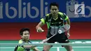 Ganda campuran Indonesia, Tontowi Ahmad/Liliyana Natsir saat melawan Tan Kian Meng/Lai Pei Jing (Malaysia) pada babak pertama Indonesia Open 2018 di Istora GBK, Jakarta, Selasa (3/7). Tontowi/Liliyana unggul 21-11, 21-14. (Liputan6.com/Helmi Fithriansyah)