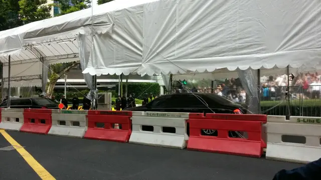 Iring-iringan rombongan Kim Jong-un memasuki area St. Regis yang menjadi tempat menginapnya selama di Singapura (Liputan6.com/Rizki Akbar Hassan)