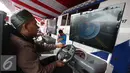 Peserta mengikuti tes uji SIM dan kir transportasi online di kawasan Monas, Jakarta, Senin (15/8). Kegiatan diadakan menyambut HUT Kemerdekaan RI ke-71 serta menciptakan layanan angkutan umum yang prima dan accountable. (Liputan6.com/Immanuel Antonius)