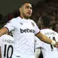 9. Dimitri Payet (West Ham) - 6 gol dan 14 assist, total 20. (AFP/Lindsey Parnaby)