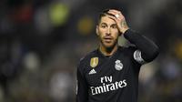 Sergio Ramos termasuk dalam barisan bek terbaik dunia sepanjang masa. Bersama Real Madrid dan timnas Spanyol ia telah meraih segalanya. Namun usia membuat performa Ramos kian menurun. (AFP/Miguel Riopa)