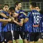 Pemain Atalanta merayakan gol yang dicetak Luis Muriel ke gawang Sampdoria pada laga lanjutan Serie A pekan ke-31 di Gewiss Stadium, Kamis (9/7/2020) dini hari WIB. Atalanta menang 2-0 atas Sampdoria.  (Gianluca Checchi/LaPresse via AP)