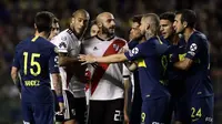 Laga bertajuk Super Claciso yang mempertemukan antara Boca Juniors vs River Plate menjadi salah satu pertandingan rivalitas yang panas di dunia sepak bola. (AFP/Alejandro Pagni)
