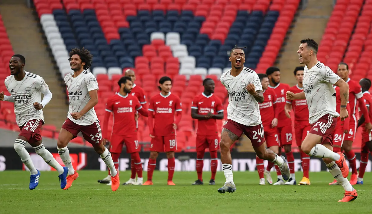 Community Shield 2020/2021. Laga final kelima yang gagal dimenangi Jurgen Klopp bersama Liverpool adalah laga Community Shield musim 2020/2021. Dalam laga yang digelar 29 Agustus 2020 di Wembley Stadium, London, Liverpool yang berstatus juara Liga Inggris 2019/2020 menghadapi Arsenal sebagai juara Piala FA 2018/2019. Hasilnya, kedua tim bermain imbang 1-1 di waktu normal, dan Liverpool akhirnya kembali kalah adu penalti dengan skor identik seperti musim sebelumnya, kali ini dari Arsenal. (AFP/Pool/Justin Tallis)