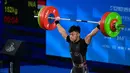Dengan torehan ini, seperti dilansir situs Asian Games 2023, Rahmat Abdullah memecahkan angkatan clean jerk di kelas 73 kg. Dia memecahkan 3 rekor sekaligus di kesempatan ini. (Ishara S.KODIKARA / AFP)