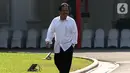 Menteri Agraria dan Tata Ruang Sofyan Djalil tiba di Istana, Jakarta, Selasa (22/10/2019). Sofyan melempar senyum kepada media jelang wawancara calon menteri Kabinet Kerja Jilid II bersama Presiden Joko Widodo. (Liputan6.com/Angga Yuniar)