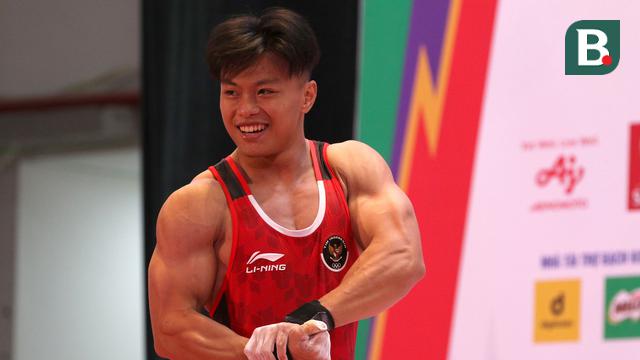 Foto: Tampil Percaya Diri, Rahmat Erwin Abdullah Rebut Emas Angkat Besi di Kelas 73 kg Putra sekaligus Pecahkan Rekor SEA Games