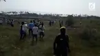 Seekor macan tutul serang sekelompok orang di India. Akibatnya empat orang terluka.