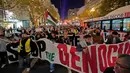 <p>Ribuan orang turun ke jalan utama Kota San Francisco mendesak pembebasan Palestina dan gencatan senjata di Jalur Gaza. (AP Photo/Godofredo A. V&aacute;squez)</p>