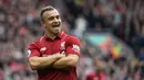 Xherdan Shaqiri - Sama seperti dua rekannya di Liverpool, Shaqiri juga dikenal sebagai pemain yang taat dalam menjalankan ibadah puasa. Saat tampil di Liga Champions 2018/19, Shaqiri tetap menjalankan ibadah puasa. (AFP/Paul Ellis)