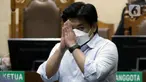 Terdakwa korupsi PT ASABRI, Heru Hidayat di Pengadilan Tipikor Jakarta, Selasa (18/1/2022). Majelis hakim memvonis nihil dan menyatakan terdakwa tidak bisa di pidana penjara karena sudah mendapat hukuman maksimal dalam perkara lain, korupsi PT Asuransi Jiwasraya. (Liputan6.com/Helmi Fithriansyah)