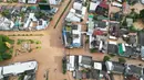 Salah satu ilmuwan konservasi Thailand mengatakan, banjir bandang dahsyat yang melanda Thailand utara juga akibat dari perubahan iklim dan salah urus bencana. (Lillian SUWANRUMPHA/AFP)