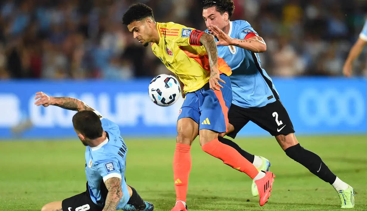 Uruguay berhasil mengalahkan Kolombia dengan skor 3-2. (DANTE FERNANDEZ/AFP)