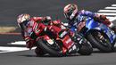 Usai insiden tersebut Jack Miller (kiri) dan Alex Rins sempat bergantian menjadi pimpinan lomba. (AP/Rui Vieira)