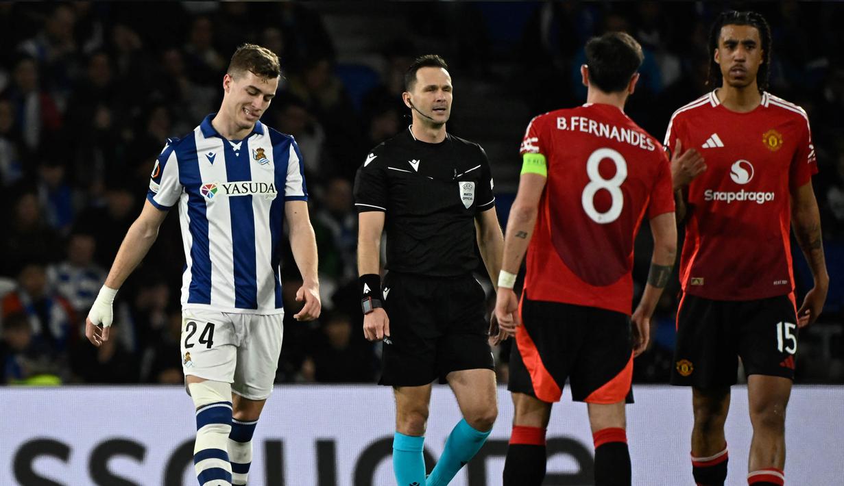 Hasil imbang pada leg pertama 16 besar Liga Europa 2024/2025 membuat kedua tim sama-sama berpeluang lolos ke perempat final. Laga leg kedua akan digelar di stadion Old Trafford, Manchester United pada pekan depan. (ANDER GILLENEA/AFP)