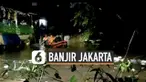 Warga Cililitan Jakata Timur selamatkan diri dari tingginya terjangan banjir. Senin (8/2) dini hari mereka dievakuasi warga menggunakan perahu karet.