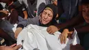 Para pelayat menghadiri pemakaman warga Palestina yang tewas akibat serangan tentara Israel di pelabuhan Kota Gaza pada hari sebelumnya, di Kota Gaza, Rabu,19 Agustus 2026. (AFP/ Omar Al-Qattaa)