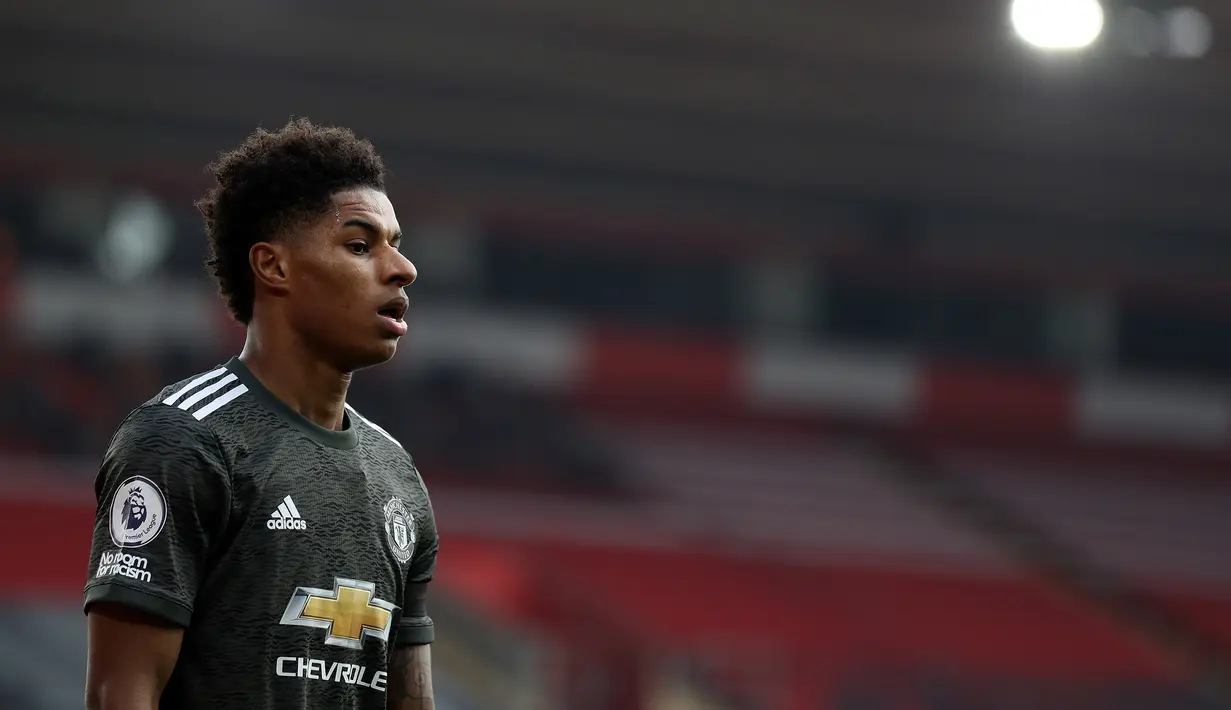 4. Marcus Rashford (6 gol) - Penyerang berusia 23 tahun ini tampil apik dan telah mengoleksi enam gol di Liga Champions. Namun sayang, Manchester United harus tersingkir dan Marcus Rashford tidak dapat menambah koleksi golnya di Liga Champions musim ini. (AFP/Naomi Baker/pool)