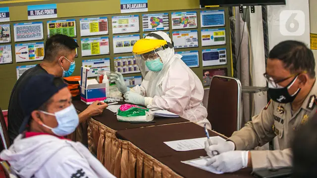 FOTO: Rapid Test Gratis di Pos Pengamanan Natal dan Tahun Baru