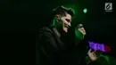 Senyum vokalis The Script, Danny O'Donoghue saat tampil dalam konser bertajuk 'Freedom Child Tour' di Jakarta, Selasa (10/4). (Liputan6.com/Faizal Fanani)