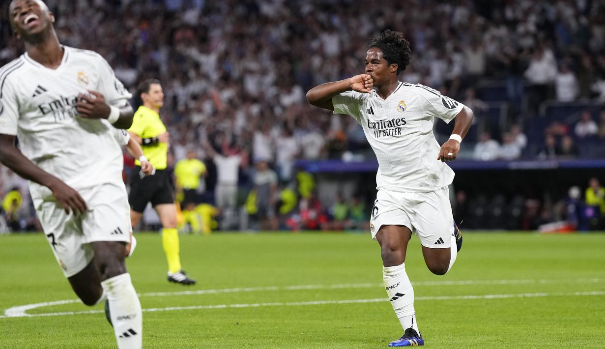 Pemain Real Madrid, Endrick melakukan selebrasi setelah mencetak gol ke gawang VfB Stuttgart pada laga Liga Champions 2024/2025 di Santiago Bernabeu, Madrid, Rabu (18/09/2024) WIB. (AP Photo/Manu Fernandez)