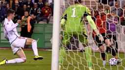 Pada menit ke-10, Belgia mencetak gol lebih dahulu. Batshuayi membuat akselerasi ke kotak penalti lalu mengirim umpan mendatar untuk De Bruyne. (AP Photo/Geert Vanden Wijngaert)