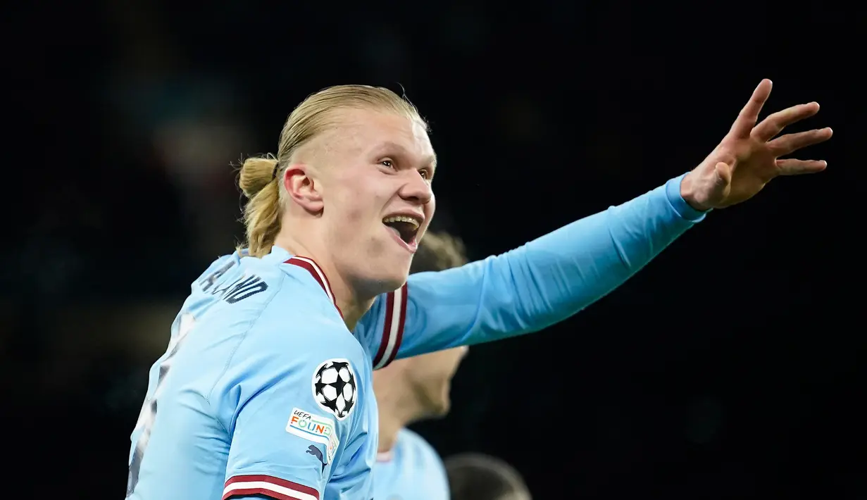Pemain Manchester City Erling Haaland bereaksi setelah mencetak gol ke gawang RB Leipzig pada pertandingan sepak bola leg kedua babak 16 besar Liga Champions di Etihad Stadium, Manchester, Inggris, 14 Maret 2023. Kendati sempat bermain imbang 1-1 pada leg pertama, Manchester City melenggang ke perempat final dengan agregat besar 8-1 usai membantai RB Leipzig 7-0 pada leg kedua. (AP Photo/Dave Thompson)